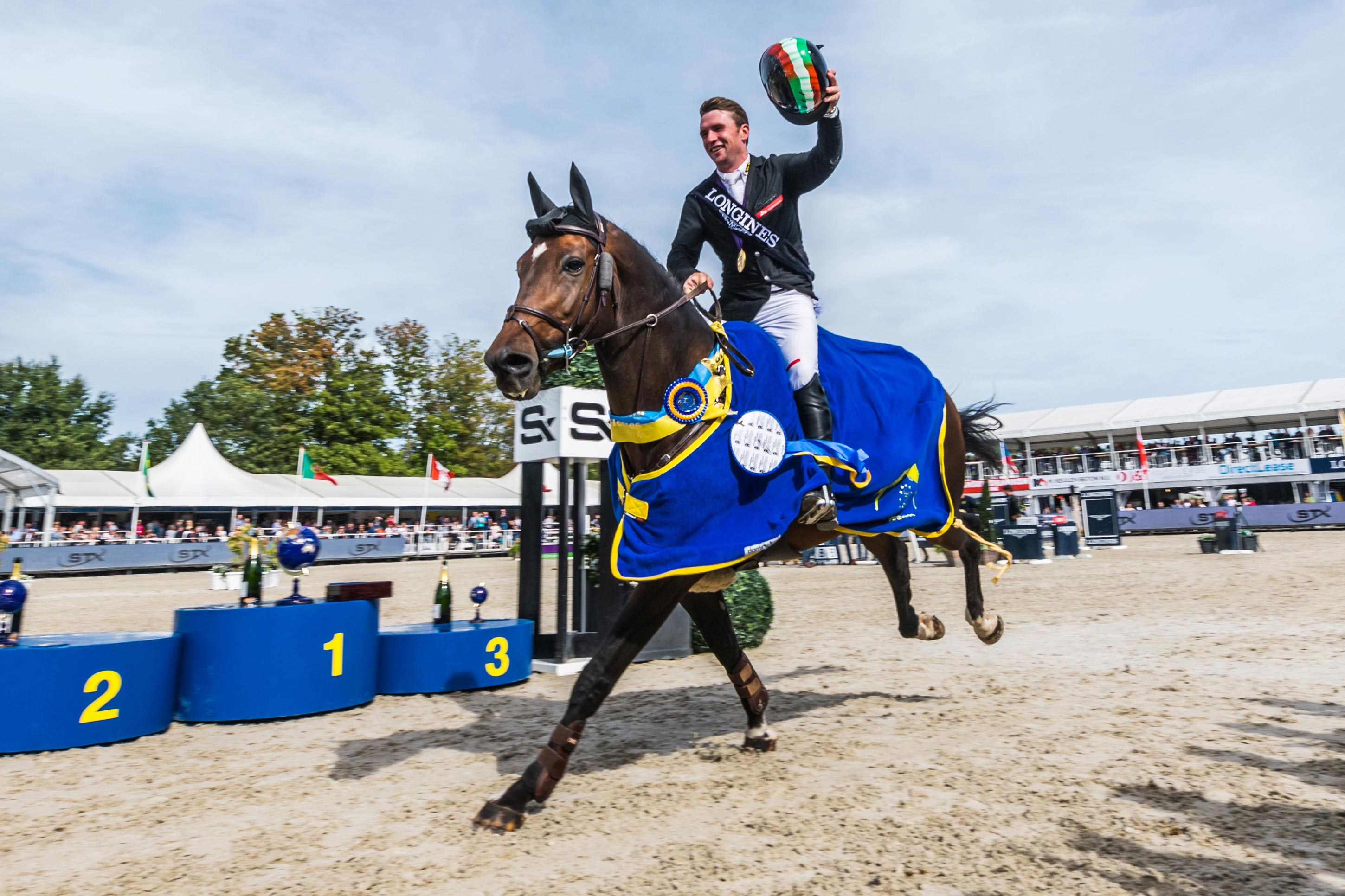 Richard Howley and Uppencourt Cappucino lead the victory parade after an Irish whitewash in the Five-Year-Old championship at the FEI WBFSH World Breeding Jumping Championships for Young Horses 2018 in Lanaken, Belgium today. (FEI/Jeroen Willems)