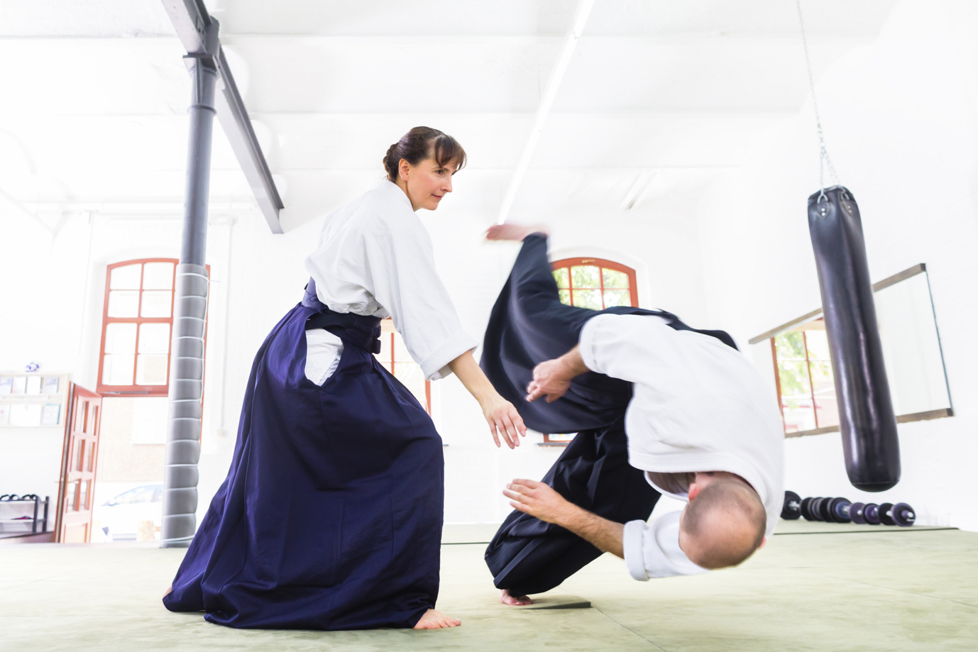 Man And Woman Fighting At Aikido Martial Arts School
