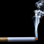 Smoking Cigarette On Black Background